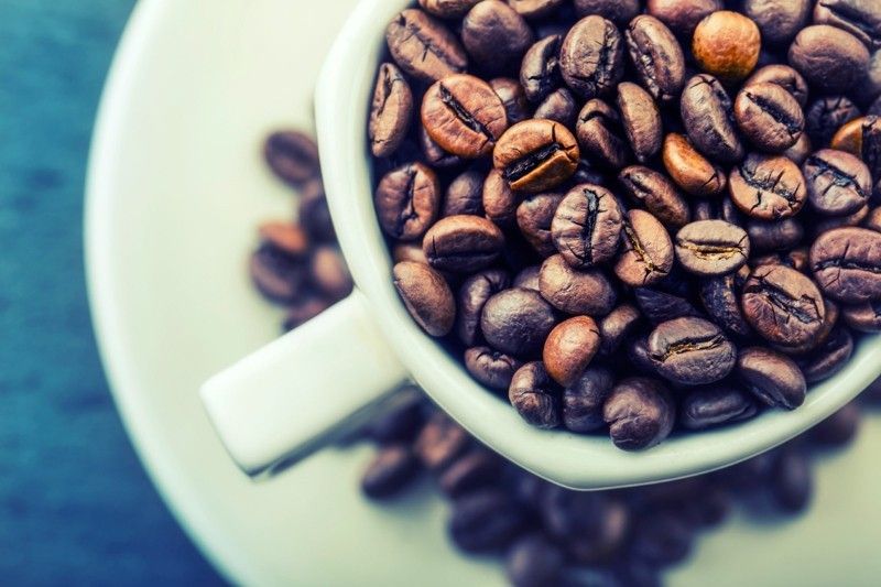 Kaffeebohnen weißer Tasse Gesunde Ernährung