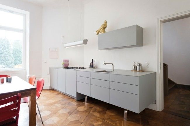 Design the kitchen in a modern way, parquet flooring