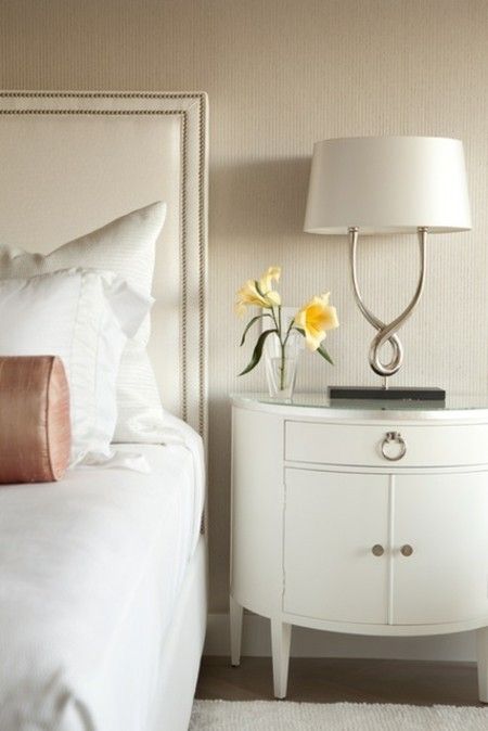 bedroom-modern-lamp-in-white-bedside table-with-drawers-and-doors