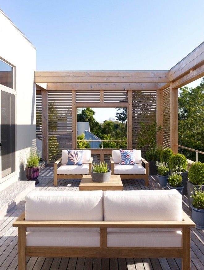 Privacy-screen-made-of-wood-modern-terrace-and-balcony-armchairs