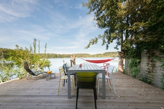 modern-terrace-and-balcony-on-the-lake-wooden-table-hammock