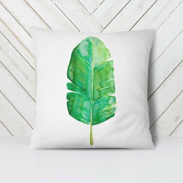 decorative-pillow-with-tropical-leaves