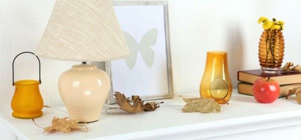 various-autumn-decoration-elements-on-the-wise-shelf-in-the-living-room
