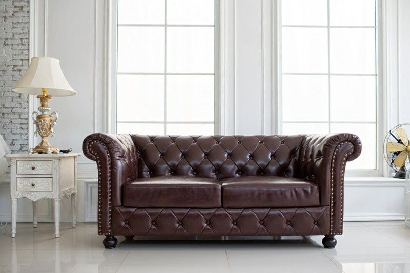 vintage-style-interior-leather-sofa-in-bright-room