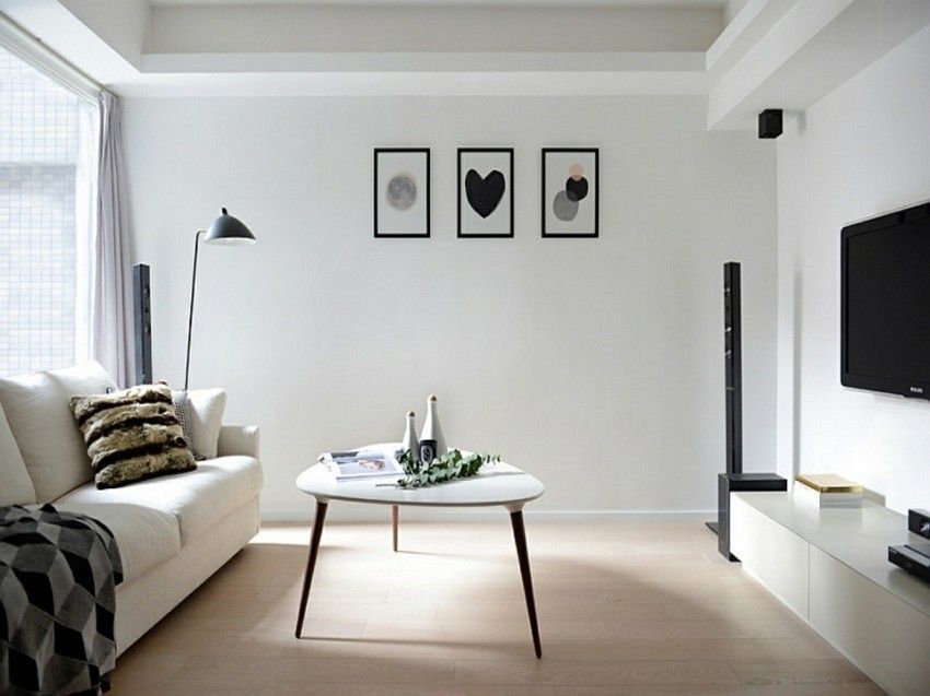 minimalistische-wohnzimmer-weis-tisch