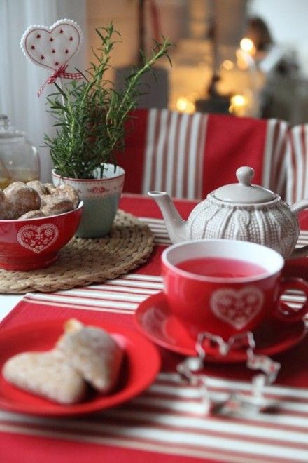 festively-decorated-table-tea-service-in-red-and-white-interesting-coasters