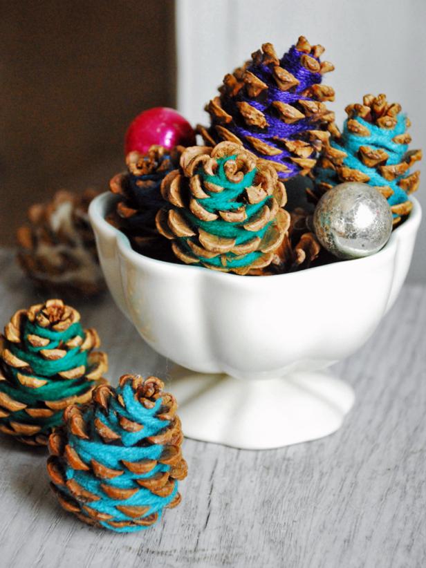 Pine cones decorated with woolen yarn