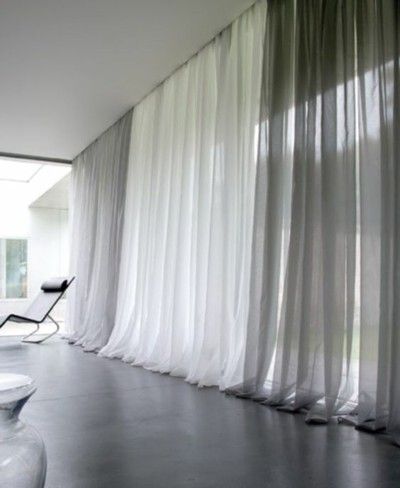 wide-window-floor-length-curtains-strong-visual-effect