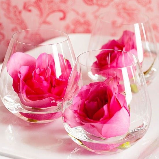 Red rose petals glass water bowls
