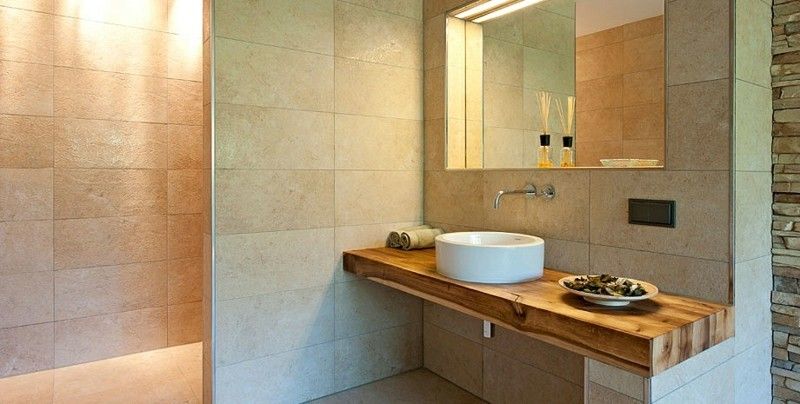 vanity-made-of-wood-and-modern-tile-wall