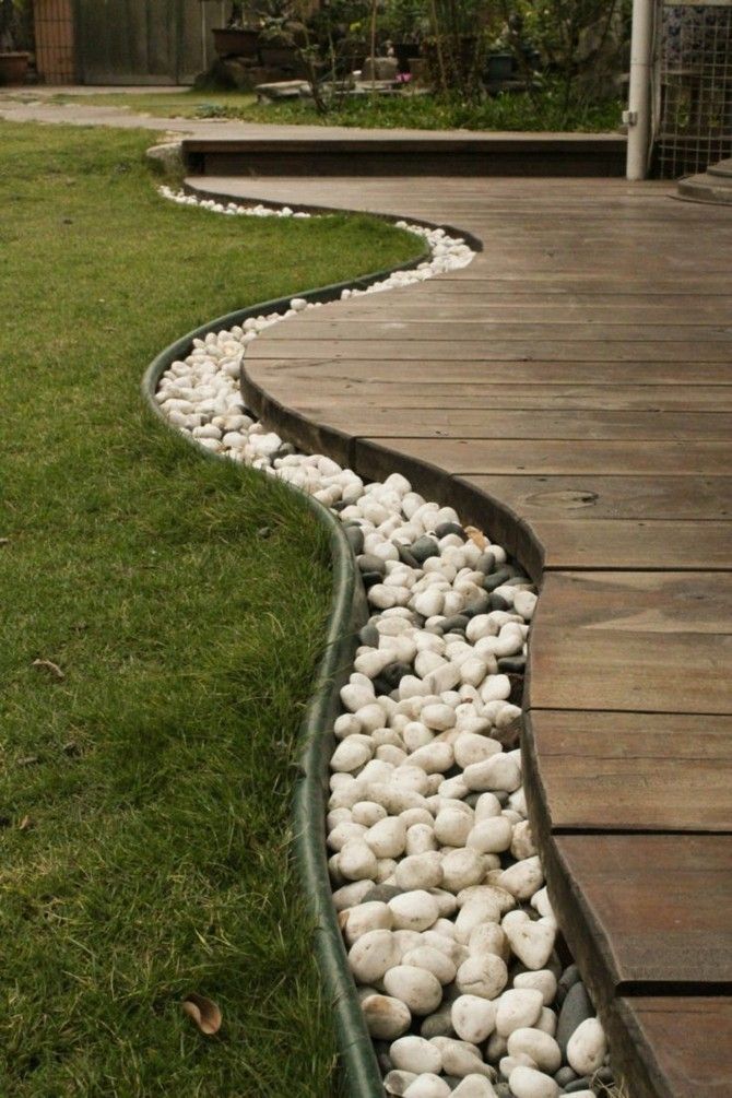 Gestaltungsideen Gartendesign weiße Steine Rand
