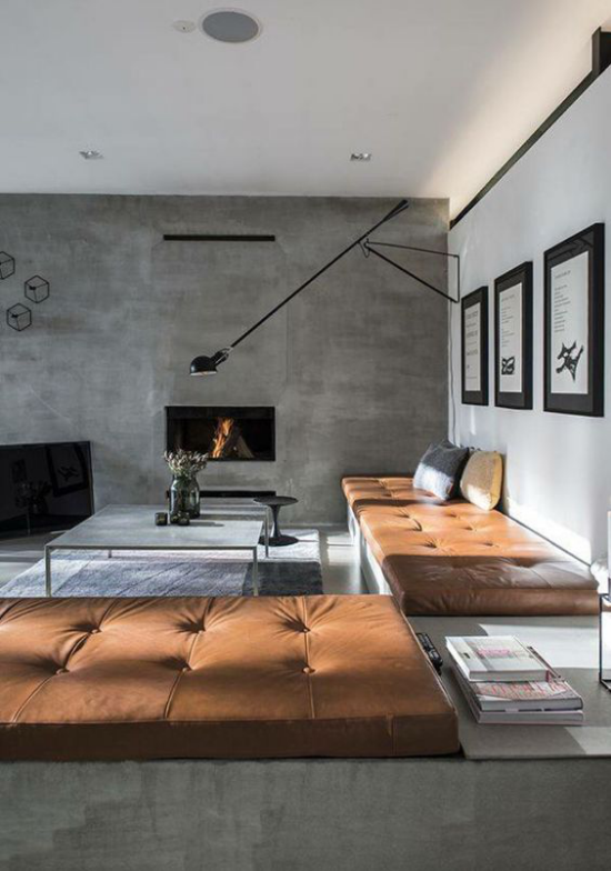 Moderne Einrichtungsideen Wohnzimmer grauen Betonwand Ledermöbel