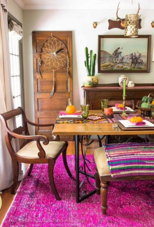 Boho chic in the dining room a lot of wood and saturated colors 