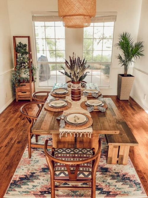  Boho chic in the dining room lots of wood warm tones green house plants