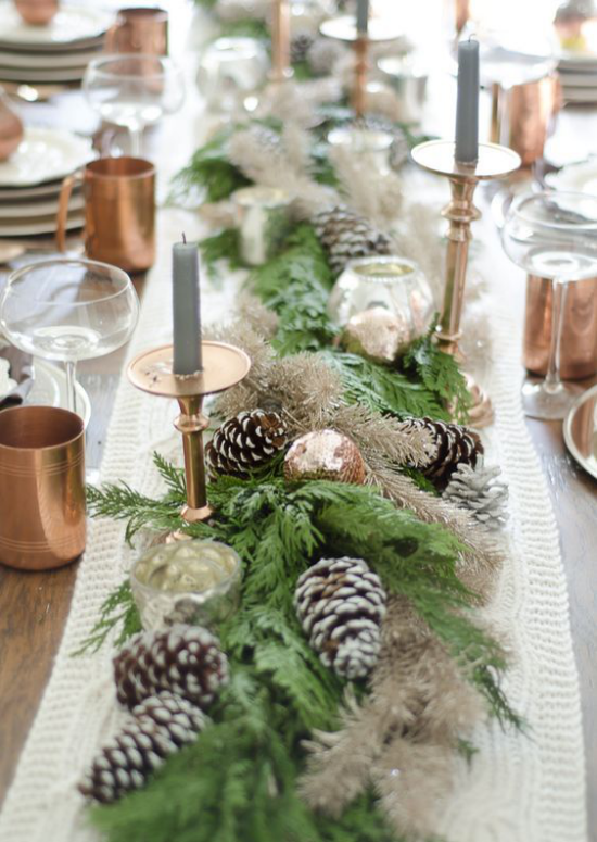 Festive table decoration ideas for Christmas table runner candles pine green 