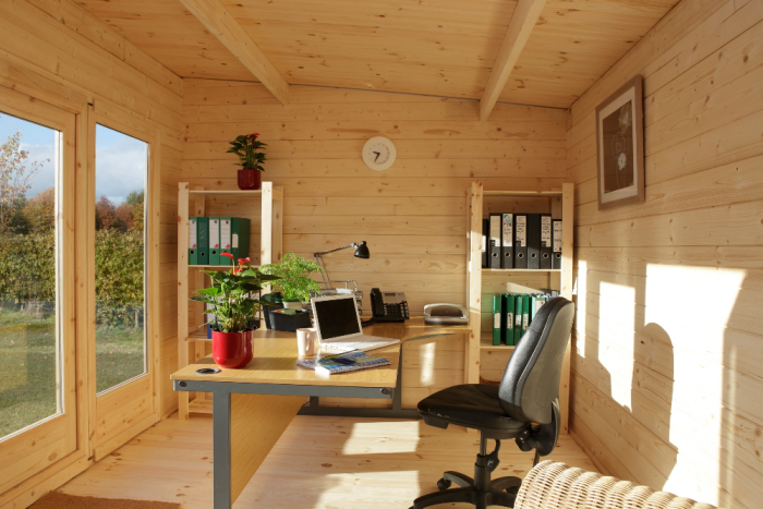 moderne Gartenhäuser sonniges praktisch eingerichtetes Homeoffice im Garten Komfort Ruhe beim Arbeiten